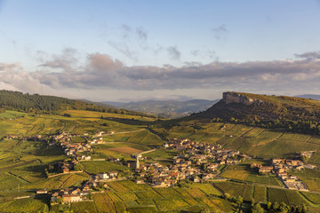 Fototapeta premium Aerial view of Vergisson village and rock in France