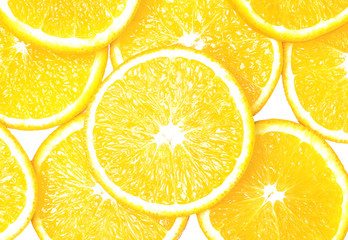 Juicy slices of orange isolated on white background. Orange textures and background