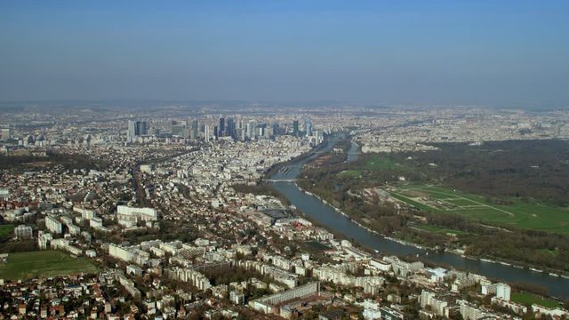  Panoramic aerial view of Paris city skyline with skyscrapers & river Seine