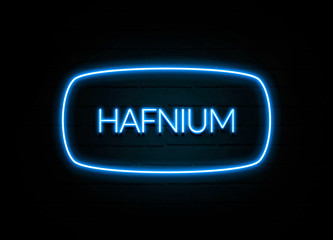 Hafnium  - colorful Neon Sign on brickwall