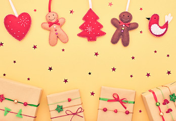 Christmas background decoration Handmade. Christmas Gift boxes holiday, Happy Gingerbread, Fir. Fun New Year XMAS Design Ornament. Festive Art Colorful Greeting Card on Yellow