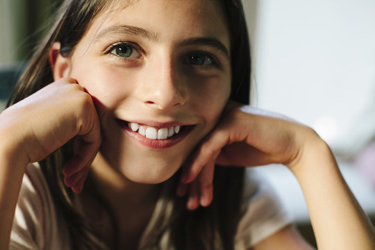 Portrait of happy twelve year old girl