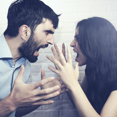 Crazy angry couple fighting hard