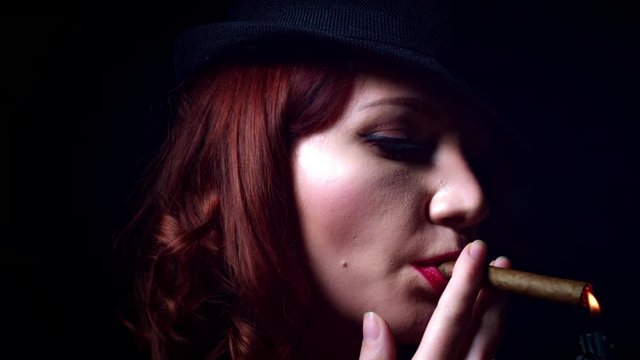 4k Gagster Style Woman Lighting up A Cigar
