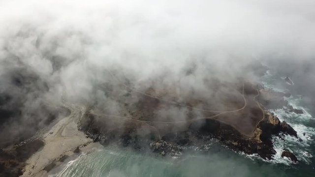 Aerial View of Fog Drifting Over Northern California Coastline