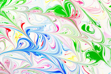 Fototapeta premium Abstract pattern, Traditional Ebru art. Color ink paint with waves. Floral background.