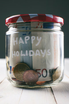 Money saving in a jar for holidays