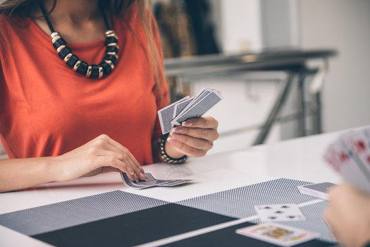 Woman Playing Card Game