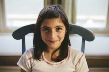 Portrait of happy twelve year old girl