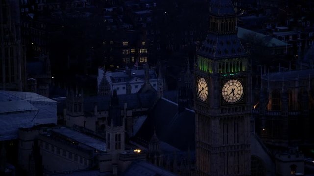 Aerial view of London's Big Ben and Houses of Parliament lit up in early morning