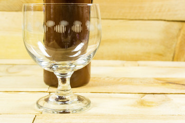 old bottle and glass goblet