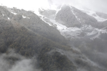 Obraz premium Panorama of the foggy winter landscape