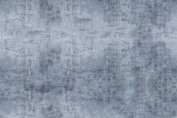 The metal surface of the wall is scratched