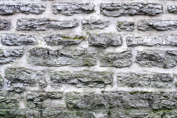 White brick masonry in the old city wall - texture Middle Ages