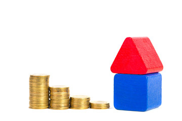 Model house wood form with step of coins stack isolated on white background, real estate investment...