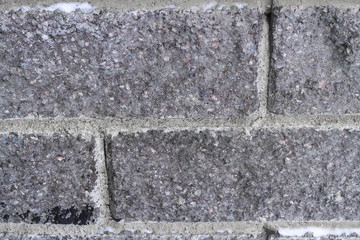 The texture of the concrete, stone brick wall gray