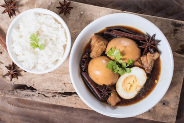 Asian food,hard-boiled egg in brown sauce or sweet gravy,Golden brown egg,Five spices egg.Top view of food