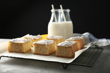 Pieces of tasty banana cake on cooling rack