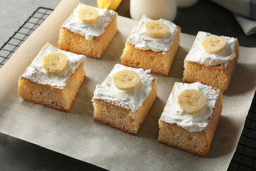 Pieces of tasty banana cake on cooling rack