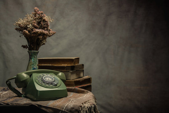 Vintage old phone on the table , still life