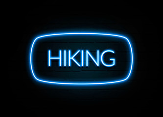 Hiking  - colorful Neon Sign on brickwall