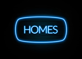 Homes  - colorful Neon Sign on brickwall
