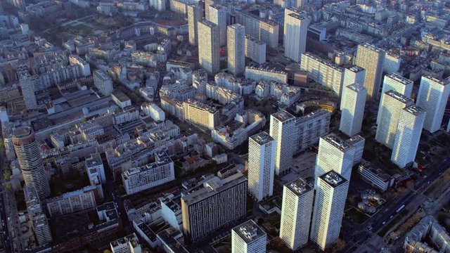 Aerial view above tower blocks and roads in a district of Paris
