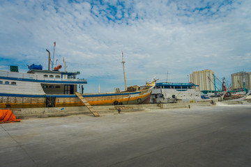 JAKARTA, INDONESIA: Traditional fishing boats lying at harbor on a beautiful sunny day