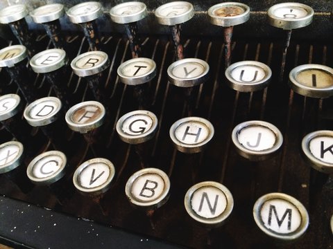 Vintage antique typewriter machine keys and letters