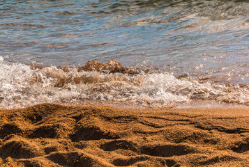 Waves and Splashes of Water on the Shoreline