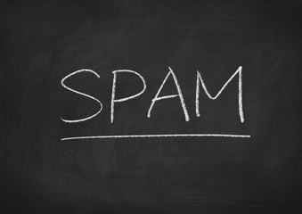 Obraz premium spam concept word on a blackboard background