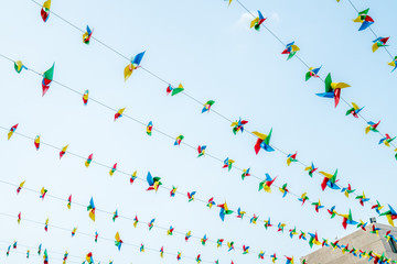 Color windmill hanging in the sky.