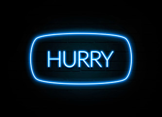 Hurry  - colorful Neon Sign on brickwall