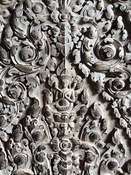 Stone figures carved in ancient temple wall