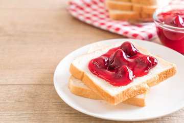bread with strawberry jam