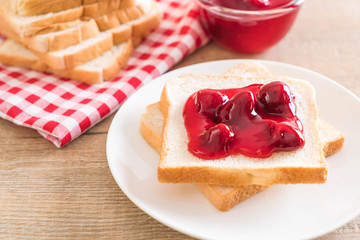bread with strawberry jam