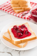 bread with strawberry jam