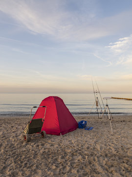 Fisherman having prepared his equipment for surfcasting