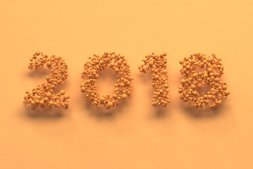 2018 number from orange balls on orange background