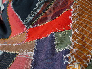 antique crazy quilt with crow's feet stitching