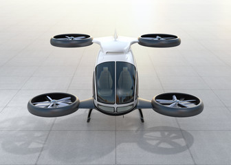 Front view of white self-driving passenger drone landing on the ground. 3D rendering image.