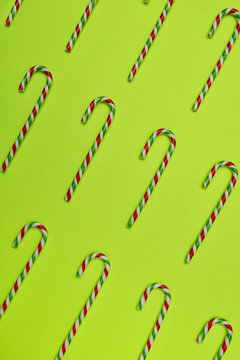 Candy Canes on Green Background