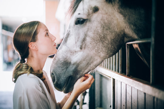 Woman and horse complicity