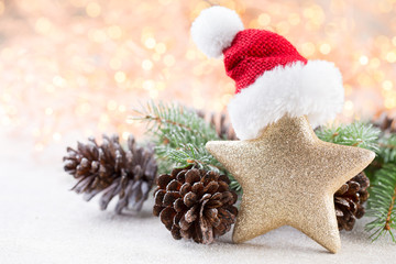Christmas background. Christmas star and santa hat. Greeting card.