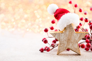 Christmas background. Christmas star and santa hat. Greeting card.