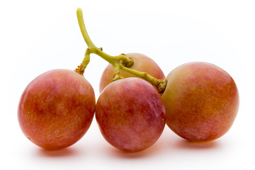 Ripe red grape isolated on white.