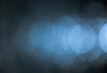 blue glitter vintage lights background,bokeh background,defocused