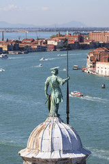 View from the bell tower of the  16th-century Benedictine San Giorgio Maggiore church on Giudecca Canal, Venice, Italy. The channel separates the Giudecca island from the Dorsoduro district.