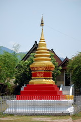Naklejka premium A small Buddhist stupa in Luang Prabang, Laos