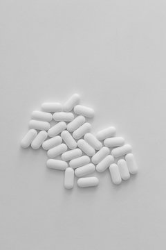 Pills on white background